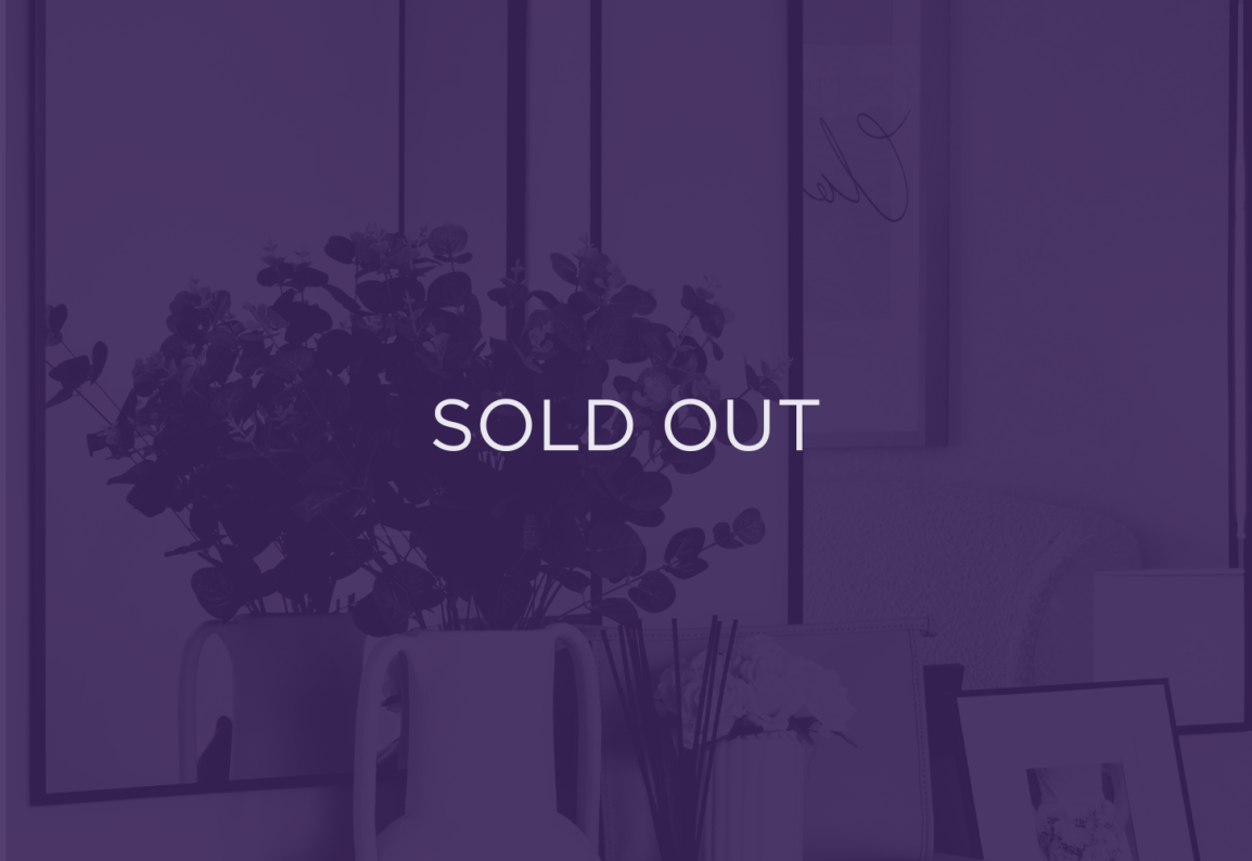 an image of a decorative plant, with a purple overlay and text that says sold out