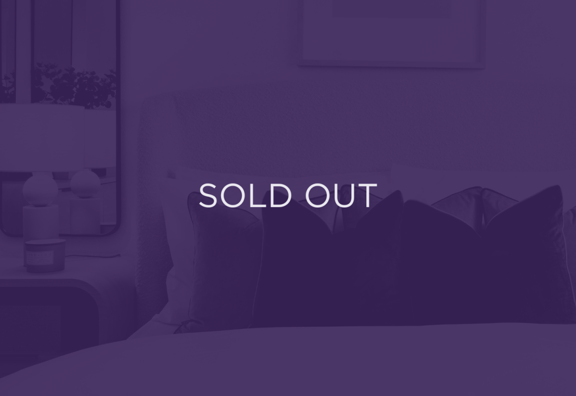 image of some cushions, with a purple overlay and text that says sold out
