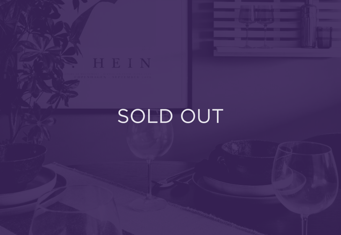 image of a dining table, with a purple overlay and text that says sold out