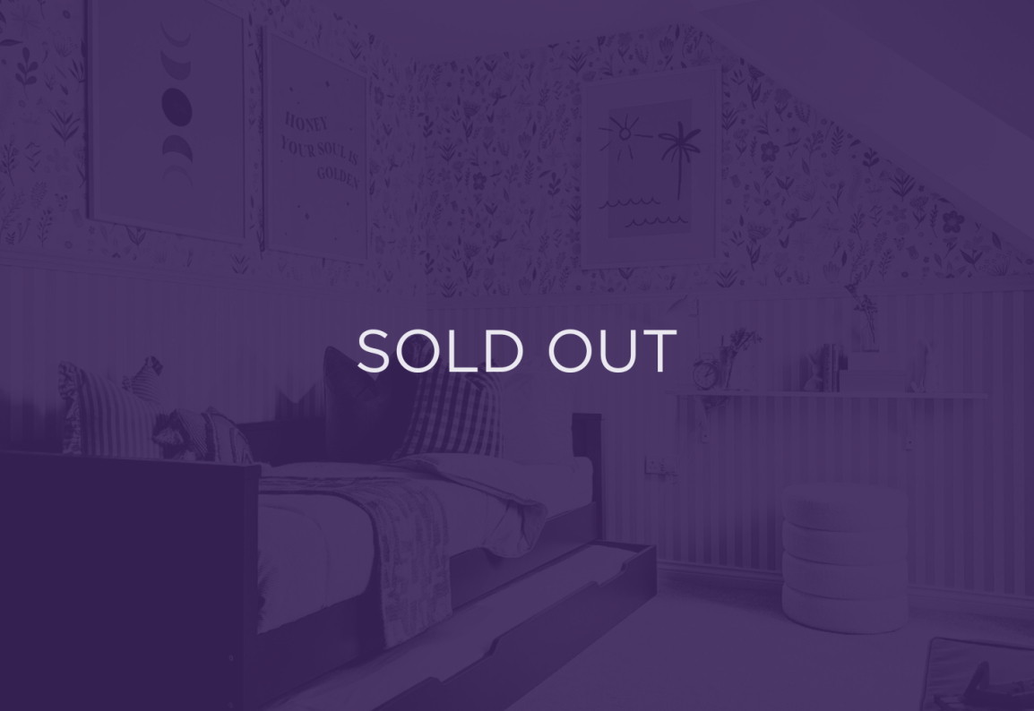 an image of a sofa with a purple overlay and text that says sold out