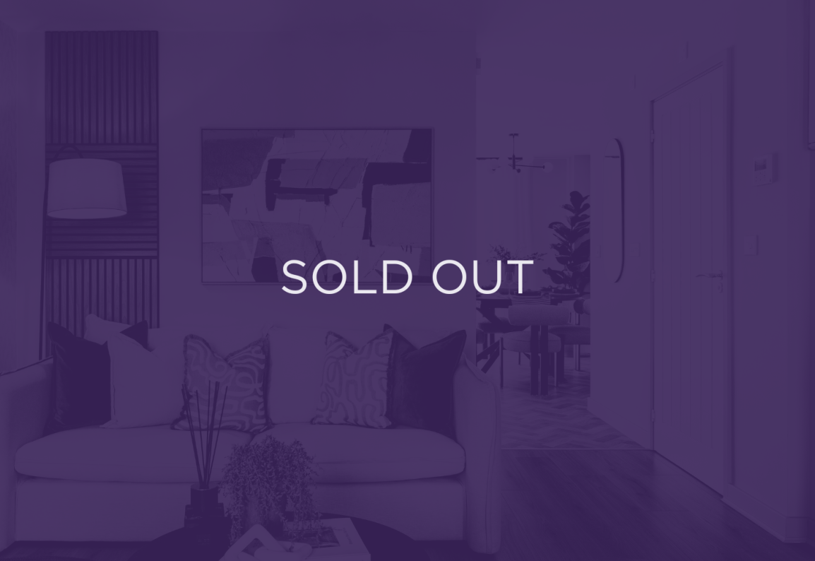 an image of a living room/kitchen, with a purple overlay and text that says sold out