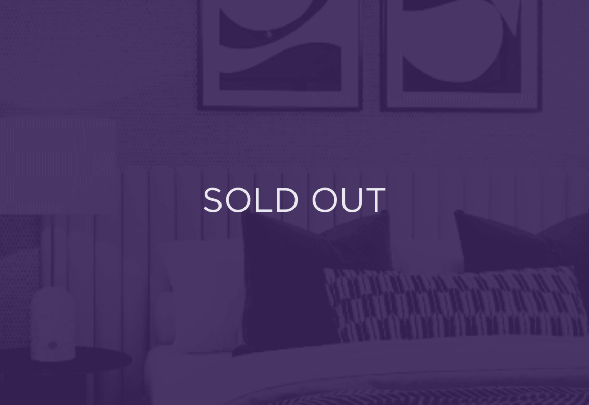 an image of a bed, purple overlay with text that says sold out
