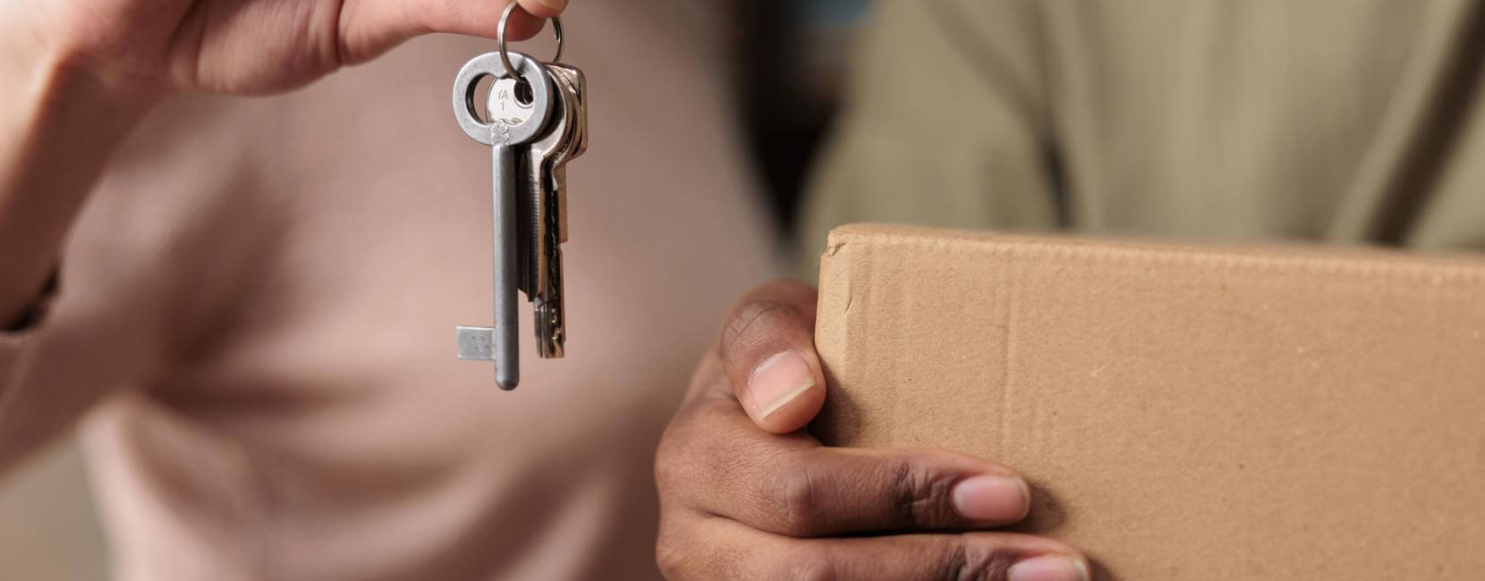 woman holding key