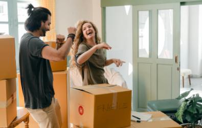 Happy Couple Moving into Their New Home