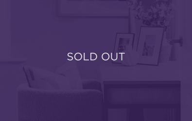 an image of a living room, with a purple overlay and text that says sold out