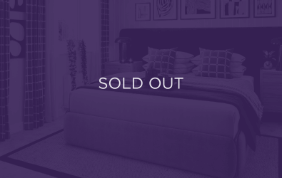 an image of a bedroom, with a purple overlay and text that says sold out