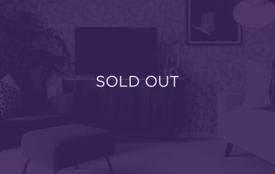 an image of a living room tv, with a purple overlay and text that says sold out
