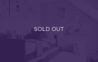 an image of a sofa with a purple overlay and text that says sold out