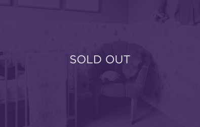 an image of a chair in a nursery, with a purple overlay and text that says sold out
