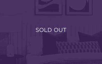 an image of a bed, purple overlay with text that says sold out