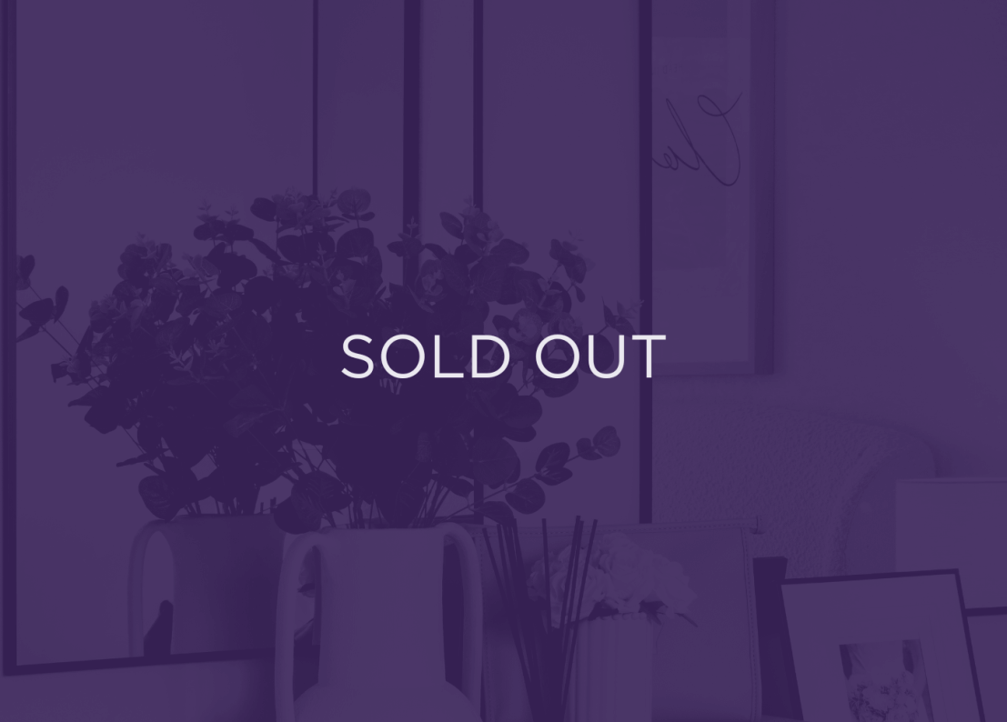 an image of a decorative plant, with a purple overlay and text that says sold out